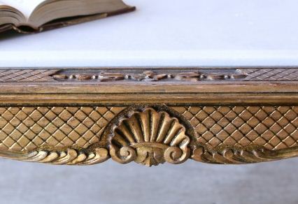 http://www.thebellacottage.com/stunning-and-chic-vintage-coffee-table-in-glistening-gilt.html